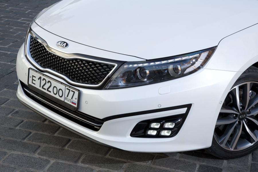  Kia Optima 2013 года  (фото 41 из 63)